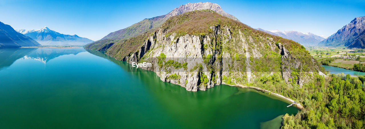 PANORAMIC VIEW OF LAKE AGAINST MOUNTAIN