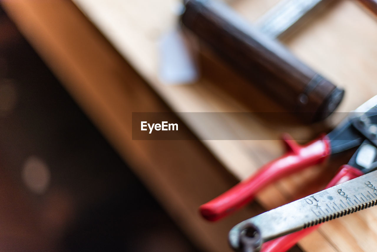 Close-up of tools on workbench