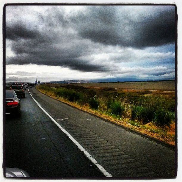 ROAD PASSING THROUGH LANDSCAPE