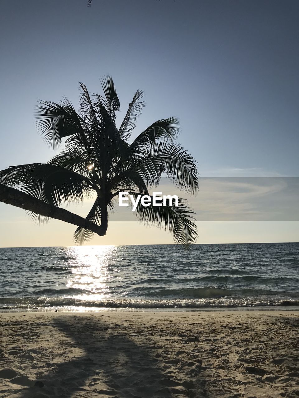 Scenic view of sea against sky at sunset