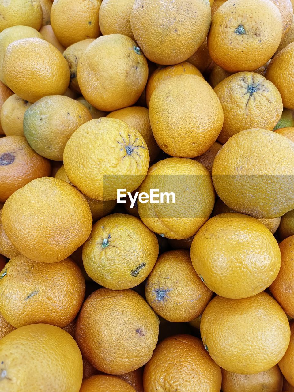 healthy eating, food and drink, food, wellbeing, freshness, fruit, abundance, citrus, large group of objects, citrus fruit, plant, lemon, full frame, backgrounds, produce, no people, market, retail, yellow, for sale, bitter orange, market stall, still life, day, tangerine, orange, close-up, organic, high angle view, heap, orange color, outdoors, citron