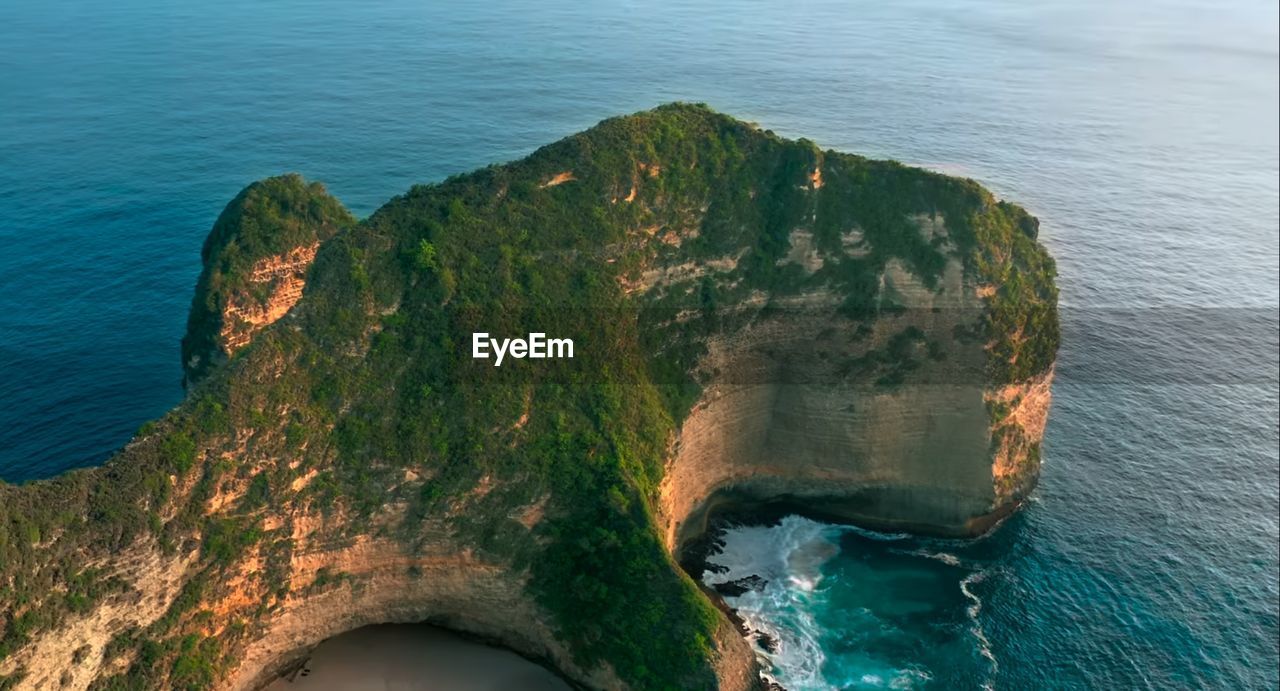 High angle view of rocks on sea