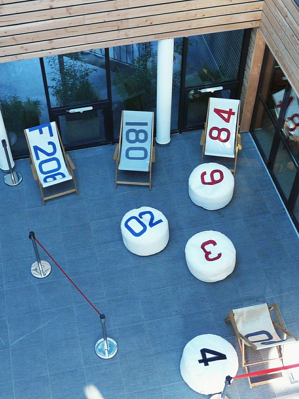 HIGH ANGLE VIEW OF INFORMATION SIGN ON SHELF