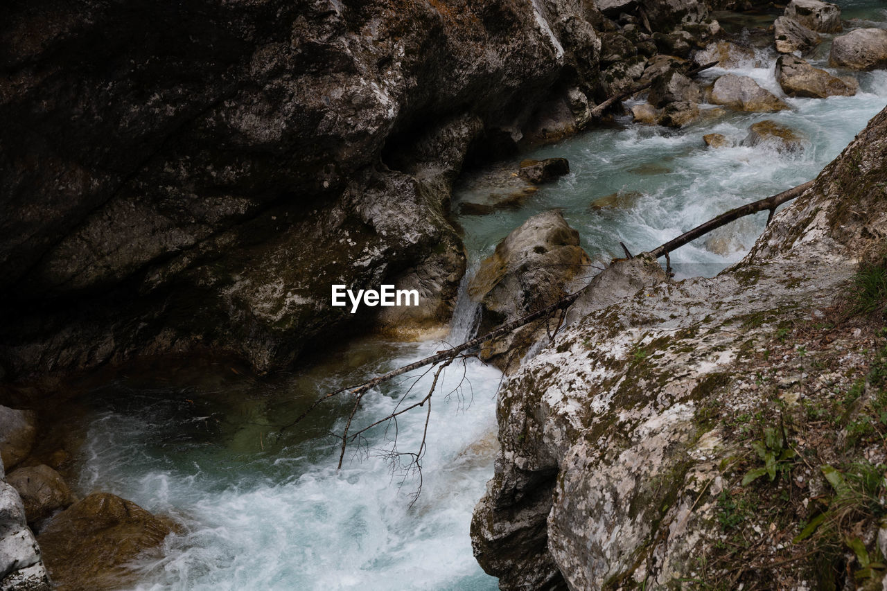Scenic view of river flowing through gorge