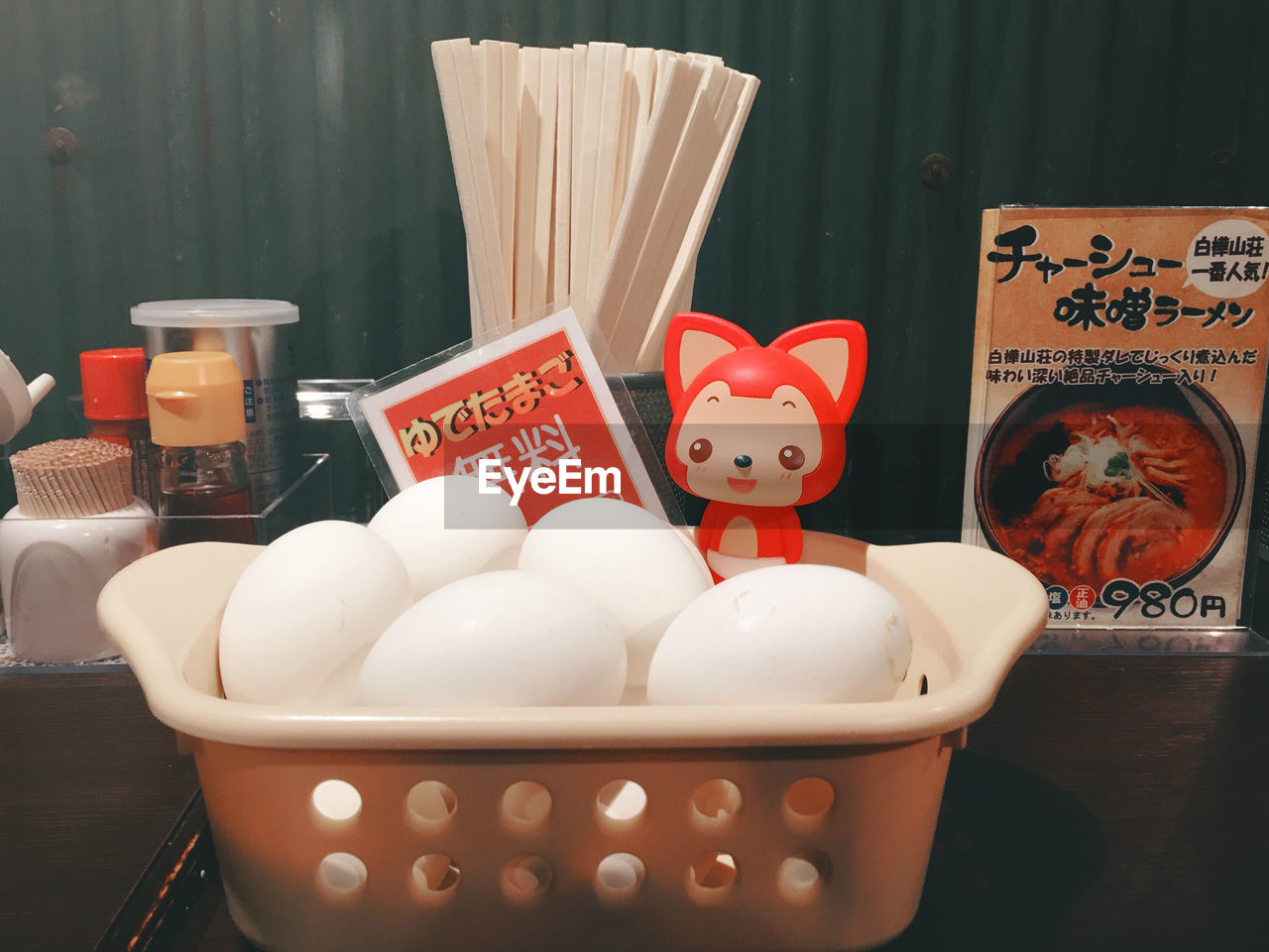 CLOSE-UP OF VARIOUS OBJECTS ON SHELF