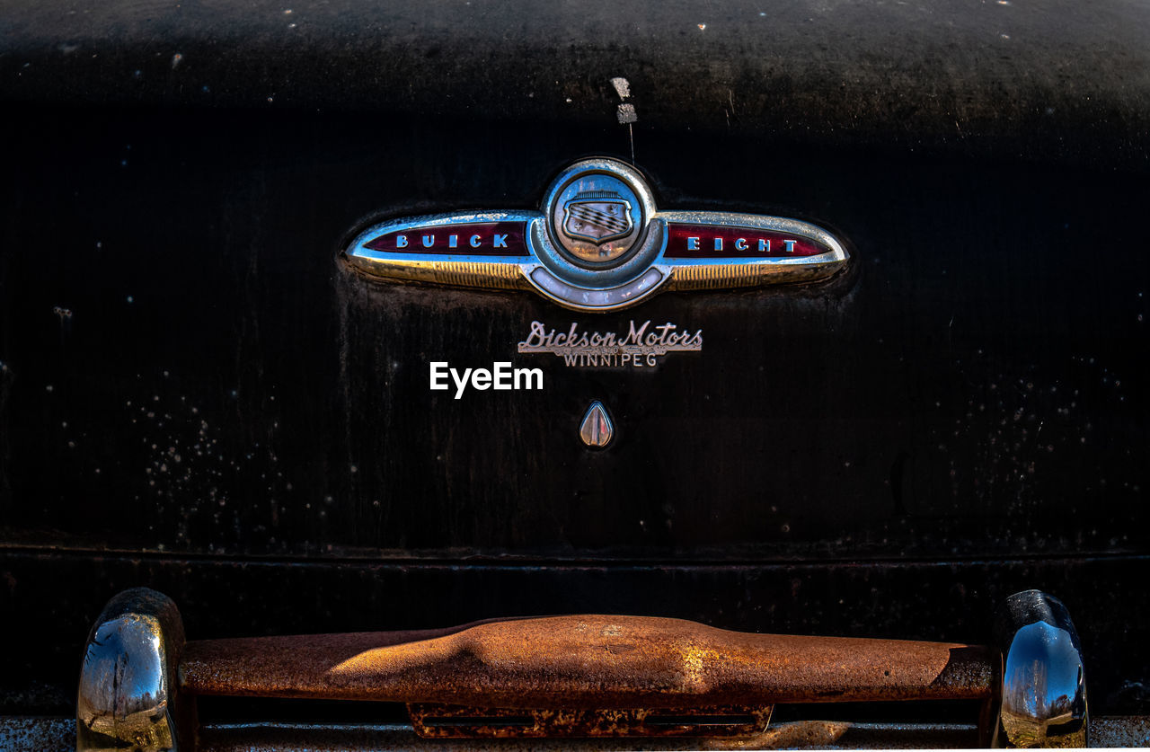 CLOSE-UP OF OLD WINE ON BARBECUE