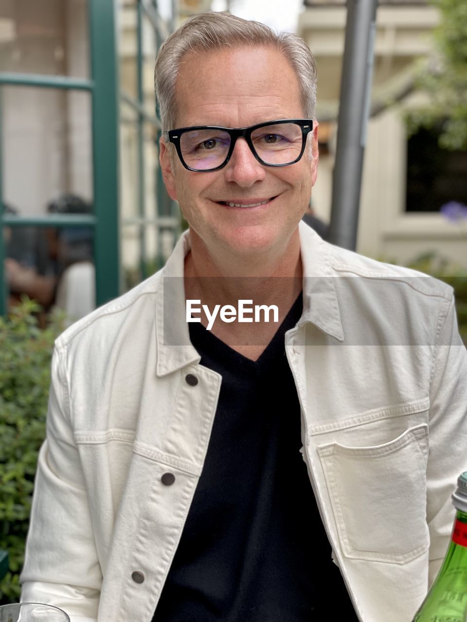 Portrait of a smiling man wearing eyeglasses