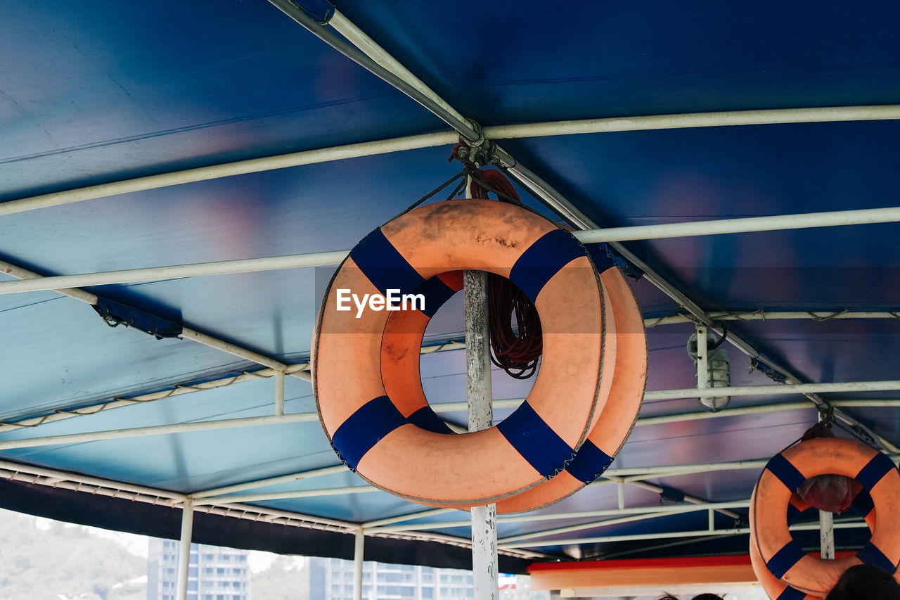 Close-up of clothes hanging on rope