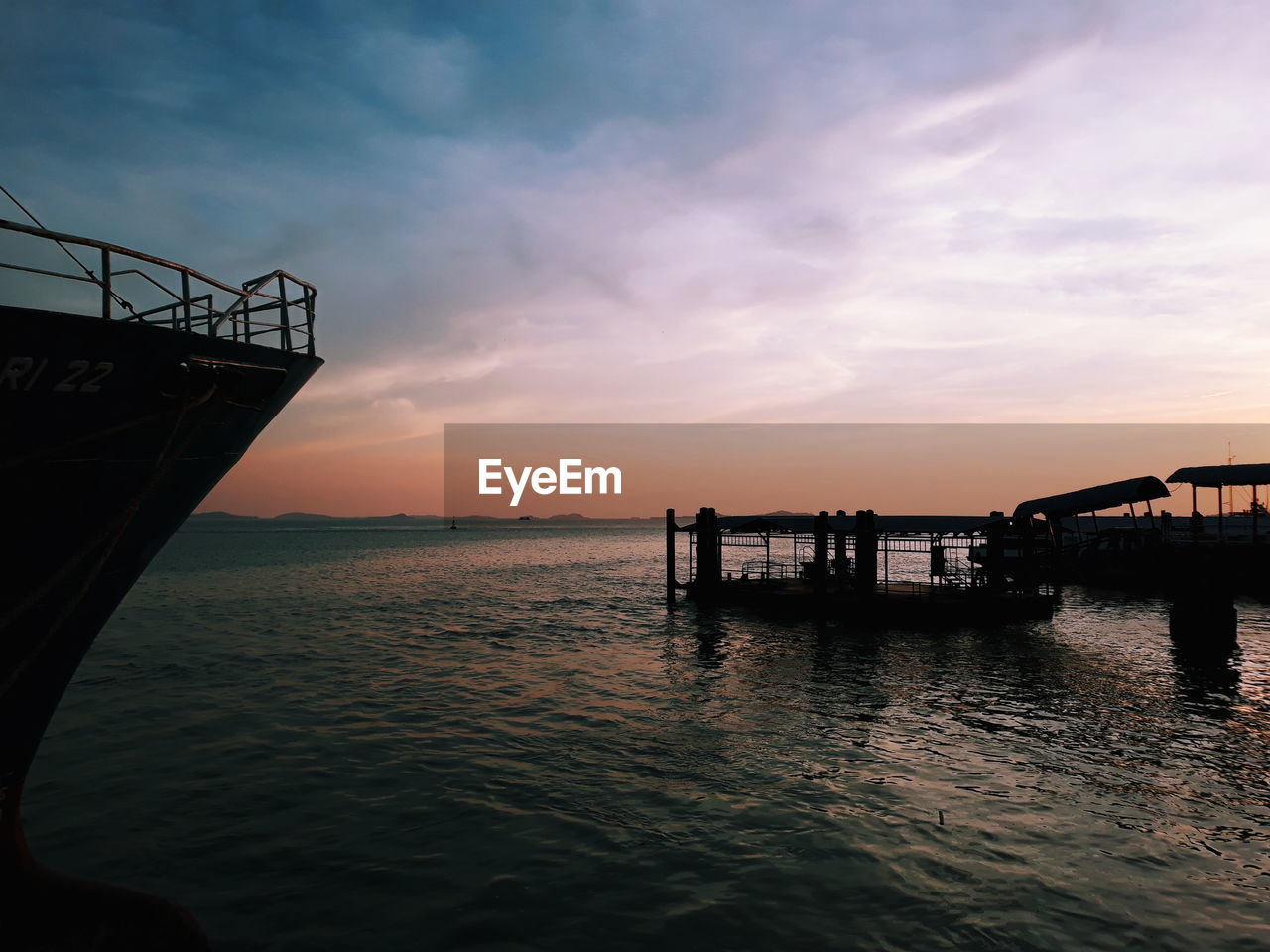 Silhouette pier on sea against sky during sunset