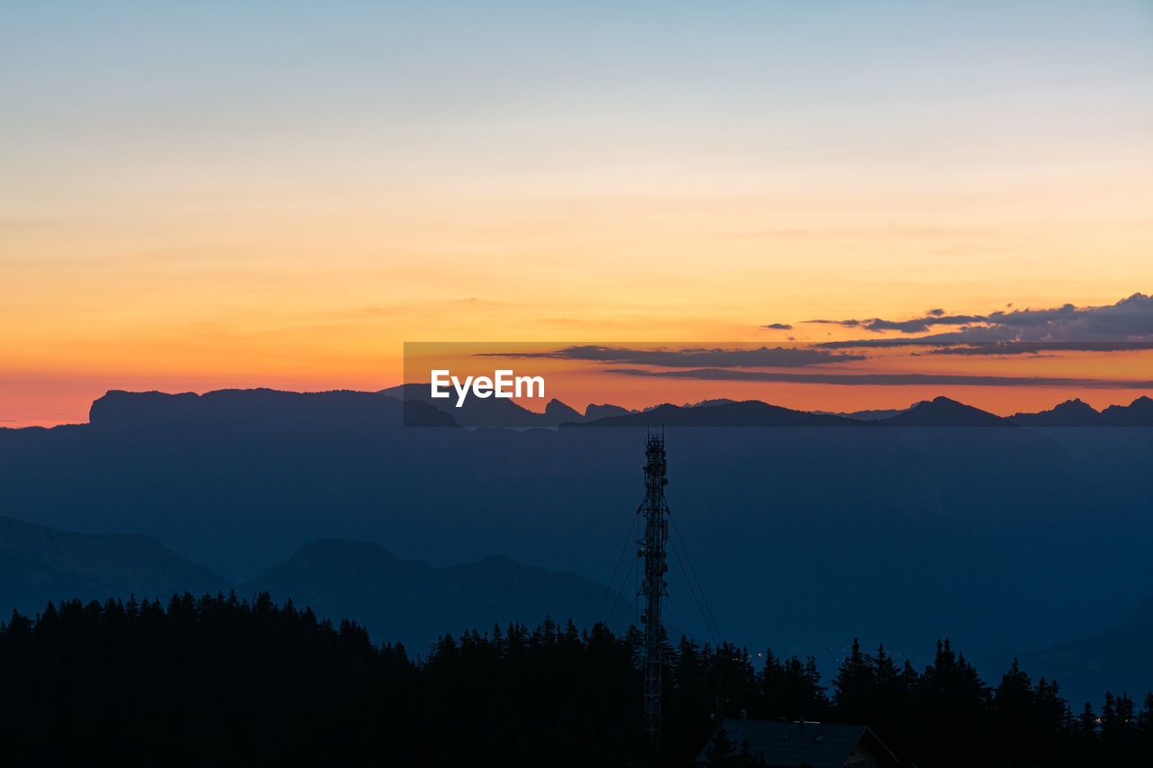 scenic view of silhouette mountain against sky during sunset