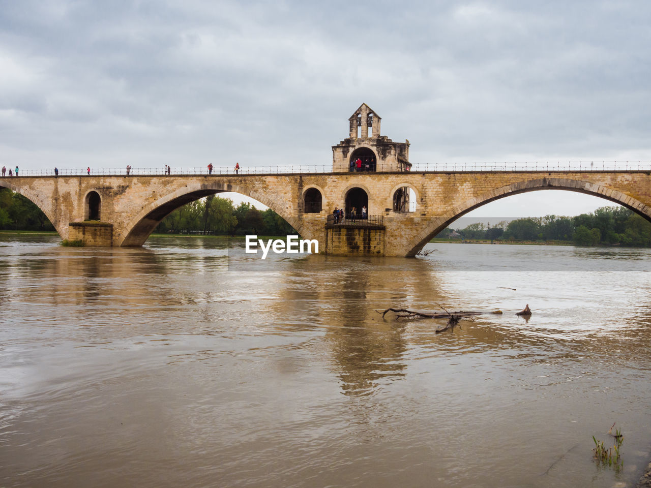 High water in rhône river with pont d'avignon