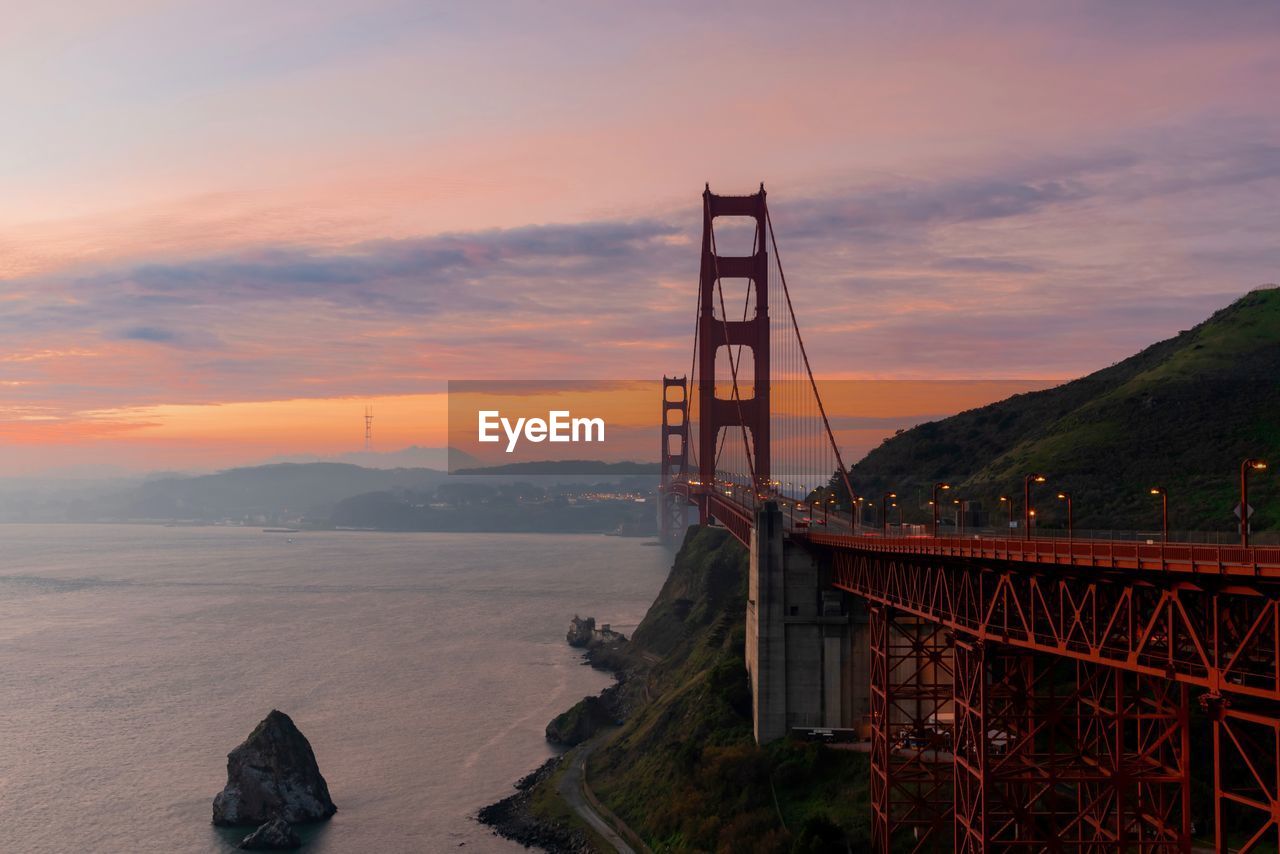 Golden gate bridge against sky during sunset