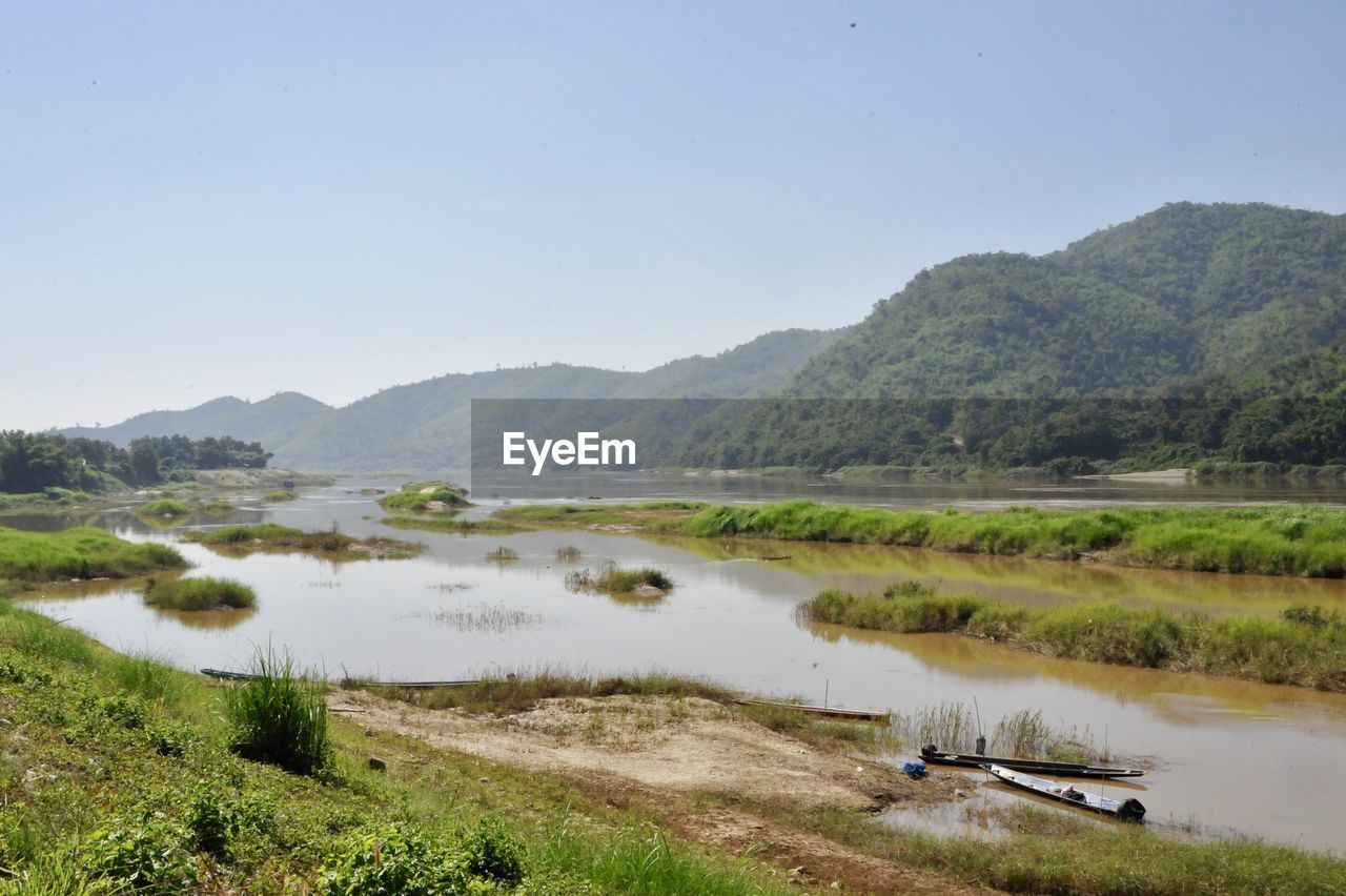 Scenic view of lake against clear sky