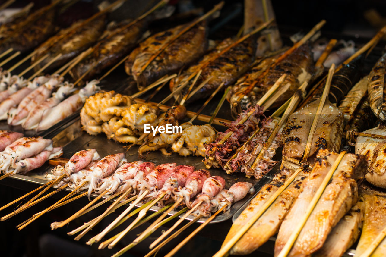 Close-up of meat on barbecue grill