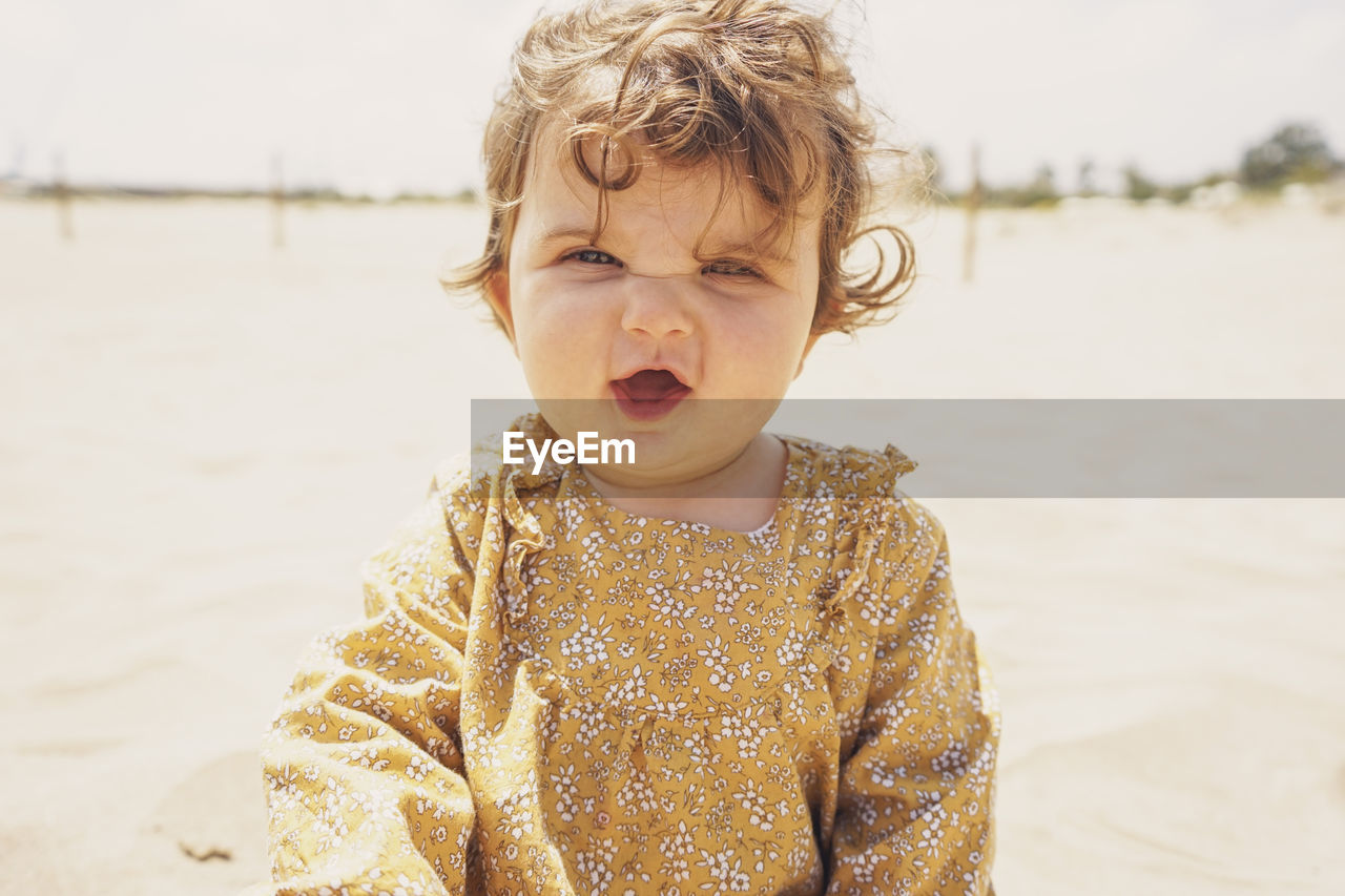 Portrait of cute boy on beach