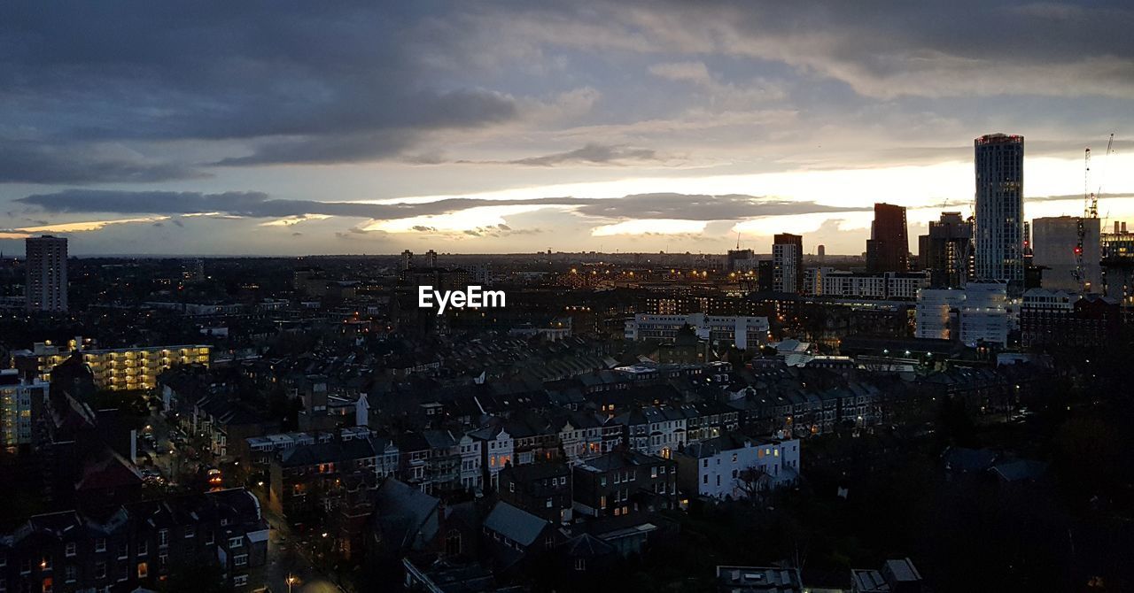 CITYSCAPE AGAINST SKY DURING SUNSET