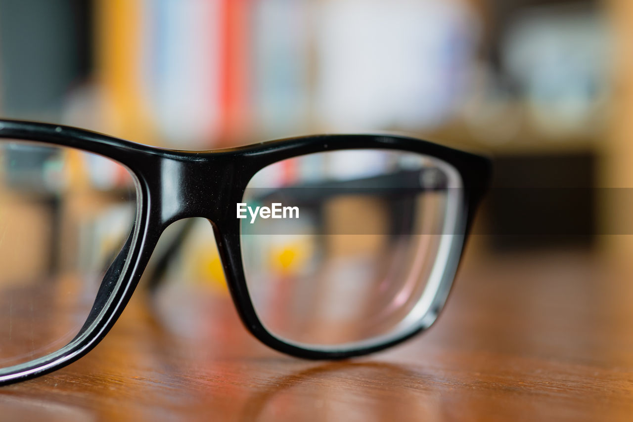 Close-up of eyeglasses on table at home