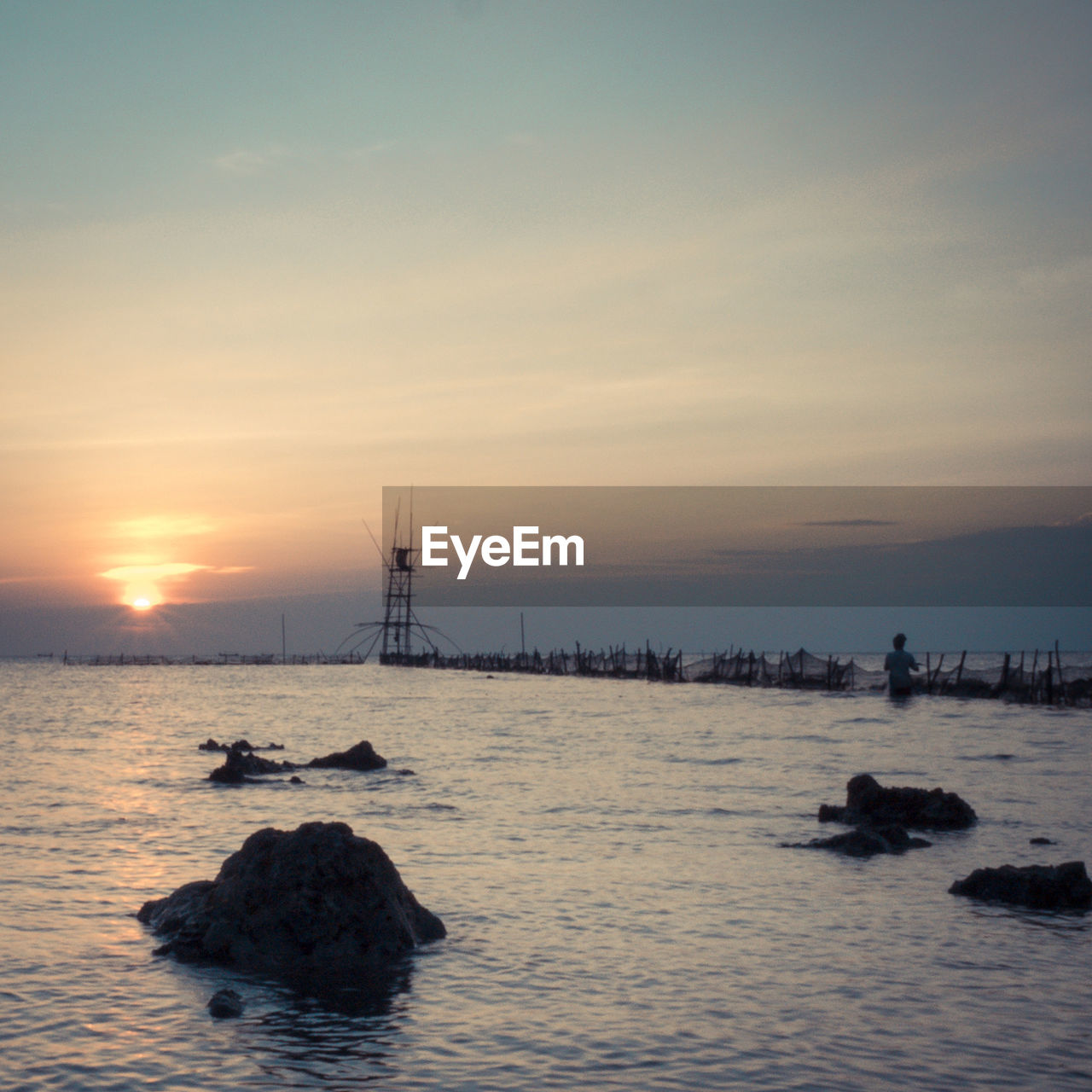 VIEW OF SEA AGAINST SKY DURING SUNSET