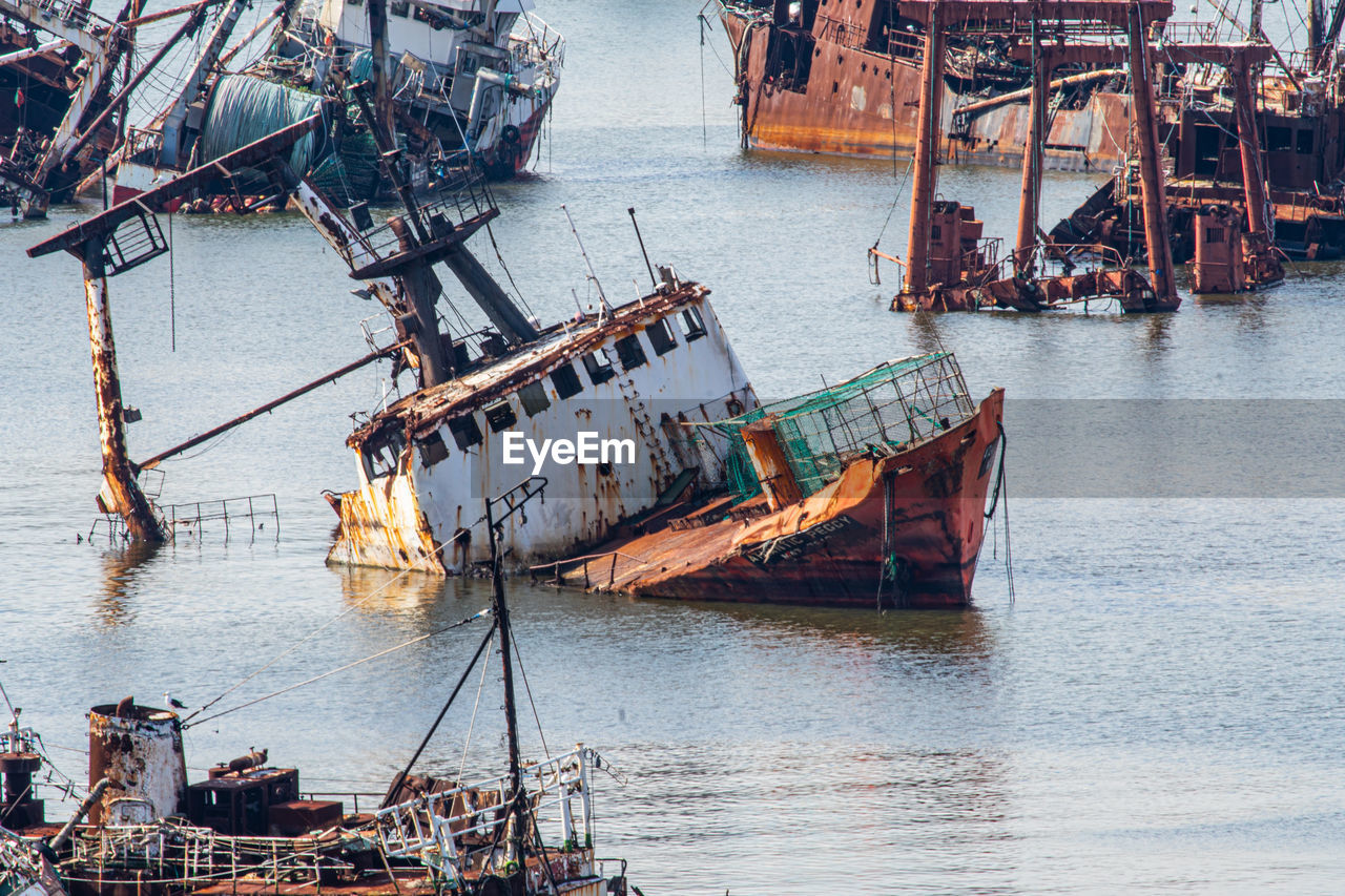 high angle view of boats moored at harbor