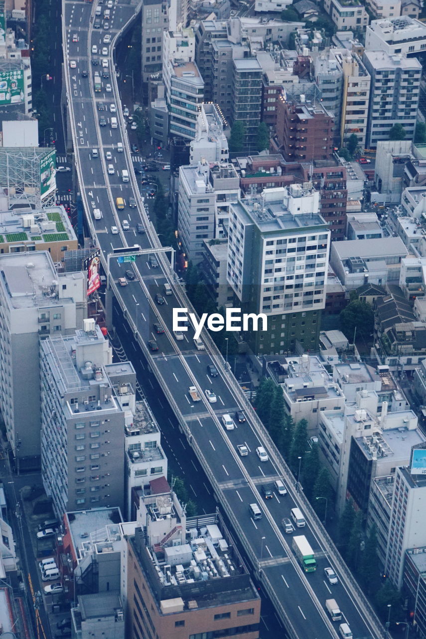 High angle view of street amidst buildings in city