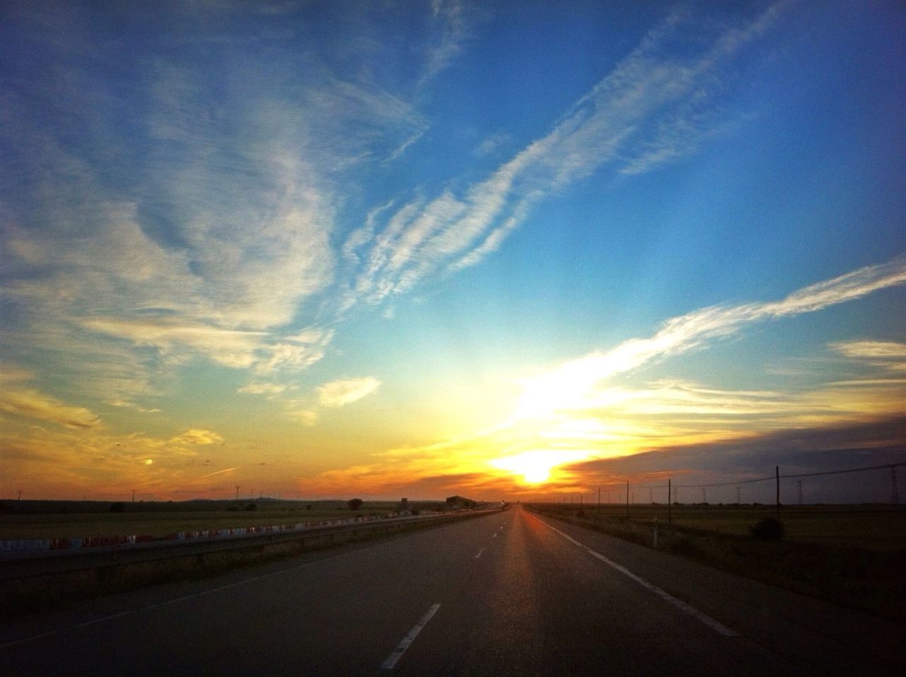 ROAD PASSING THROUGH LANDSCAPE