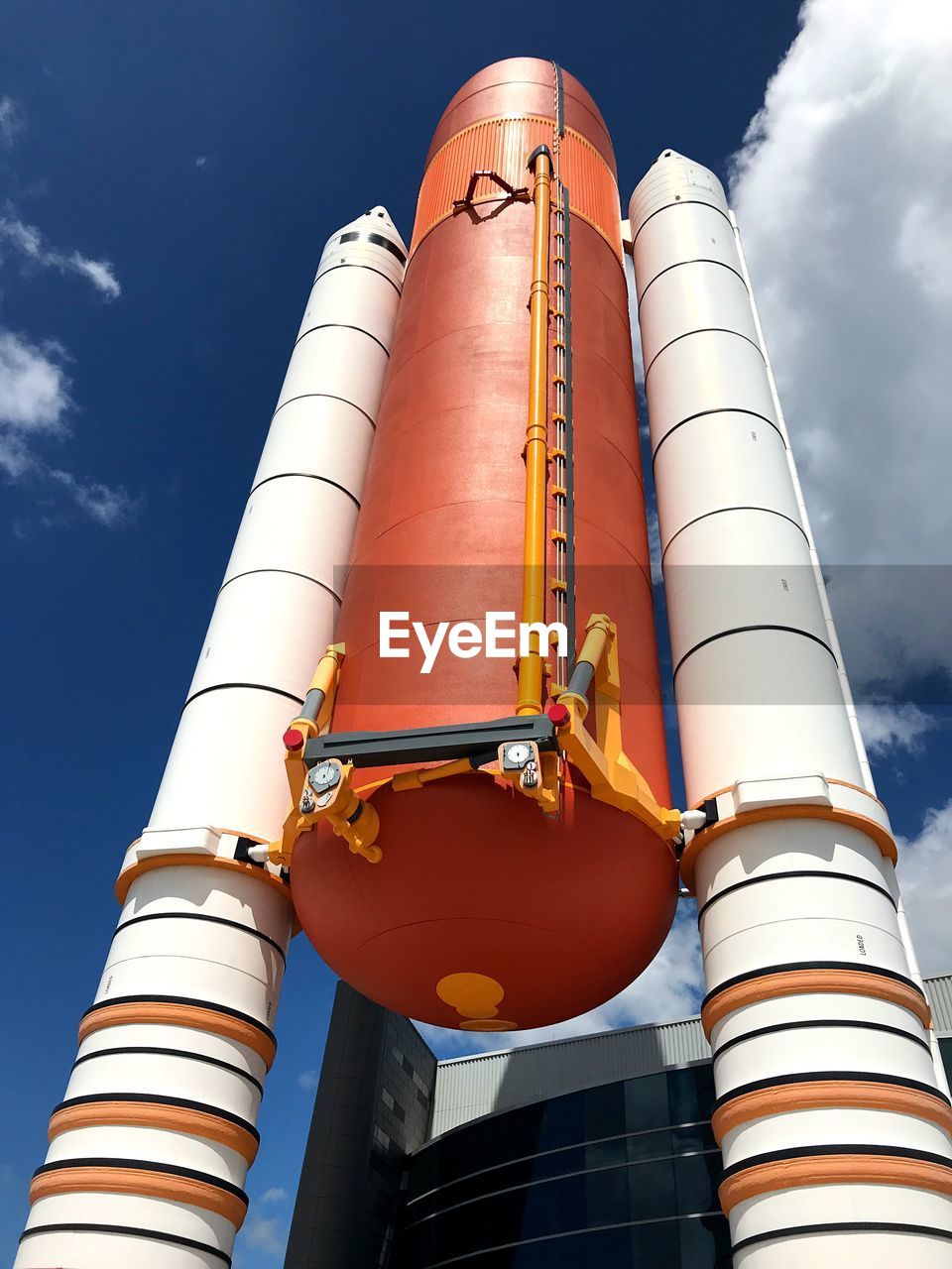 Low angle view of fuel storage tank against sky