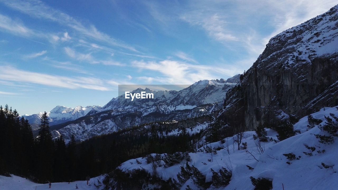 SCENIC VIEW OF SNOWCAPPED MOUNTAIN AGAINST SKY