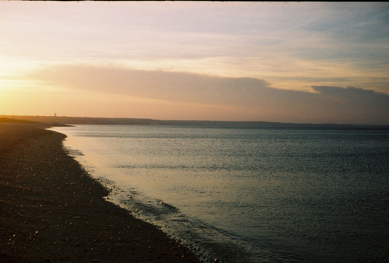 VIEW OF SEA AT SUNSET