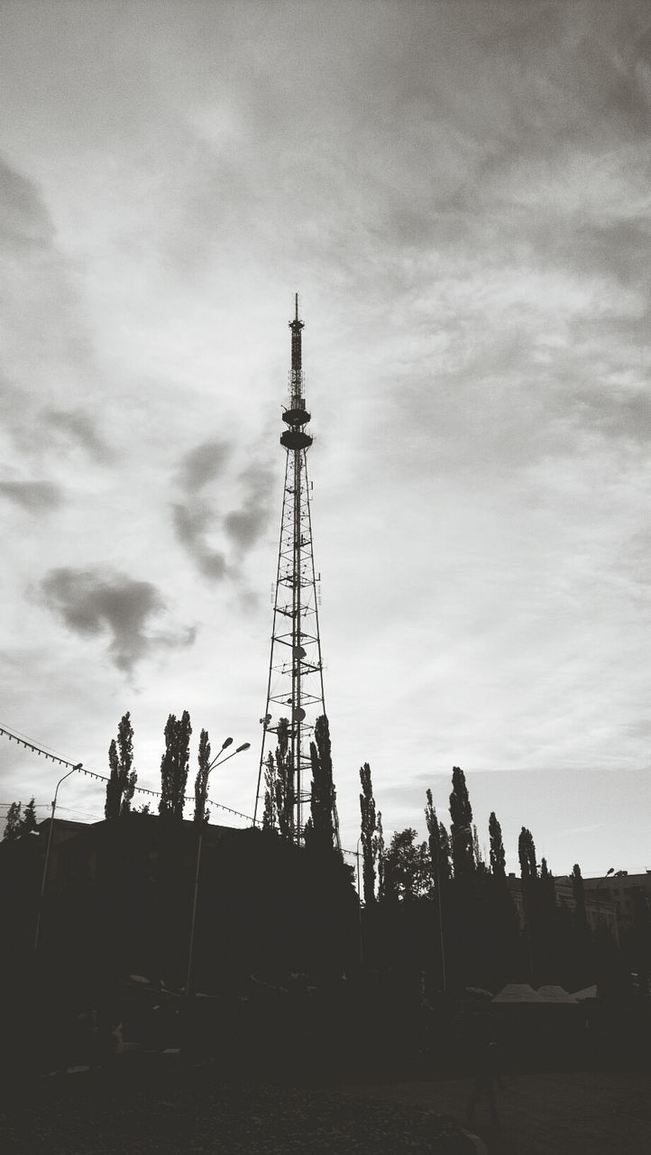 LOW ANGLE VIEW OF TOWER AGAINST CLOUDY SKY