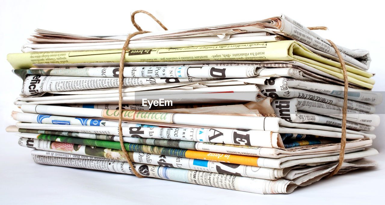 cash, large group of objects, white background, cut out, heap, abundance, business, paper, no people, document, indoors, newspaper, studio shot, finance