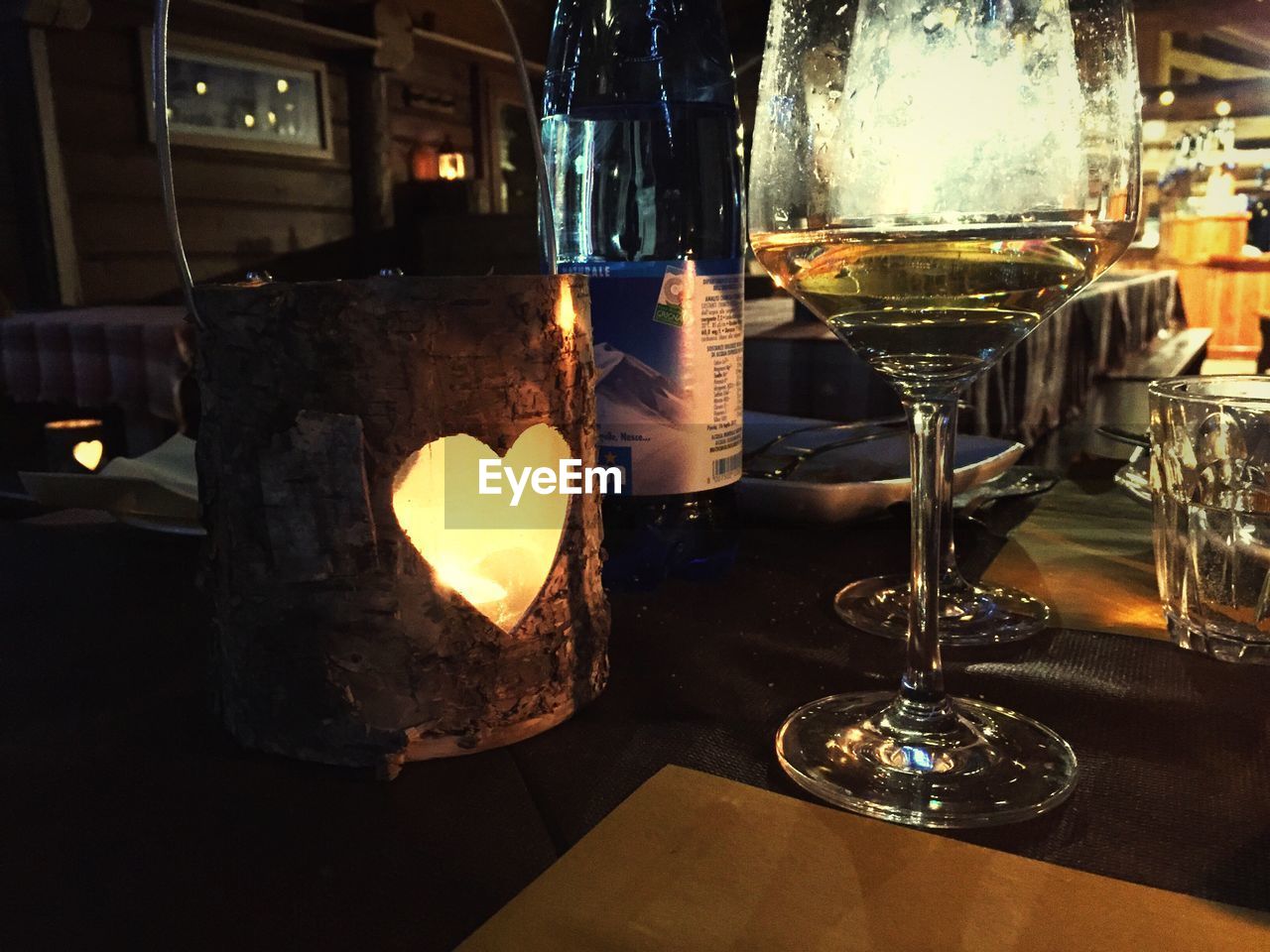 CLOSE-UP OF ILLUMINATED TABLE