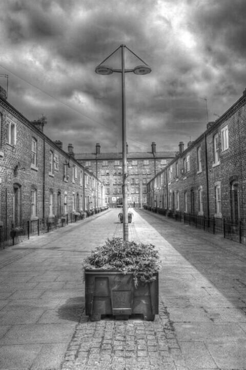 VIEW OF EMPTY ROAD AGAINST CLOUDY SKY