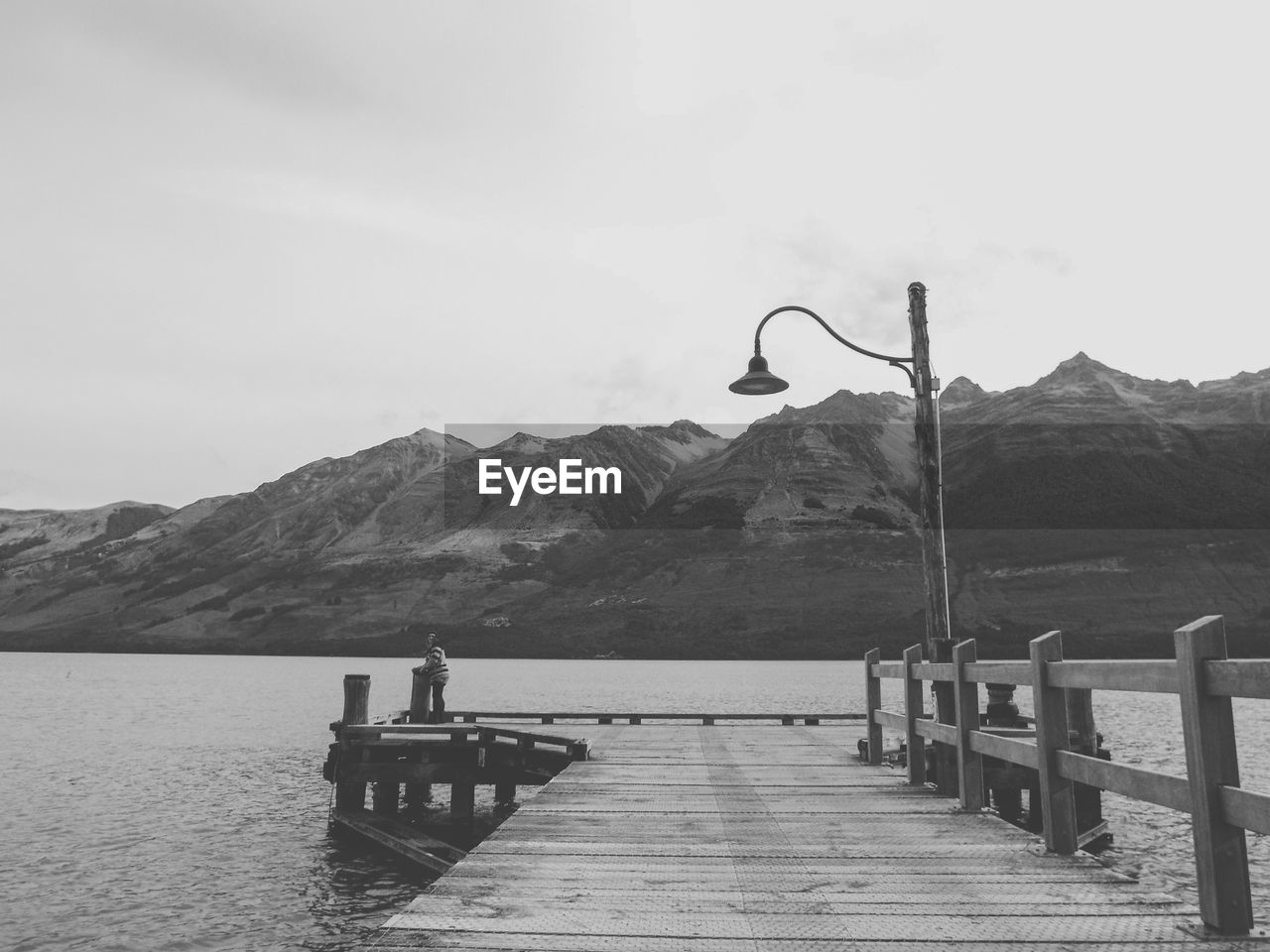 PIER BY SEA AGAINST SKY