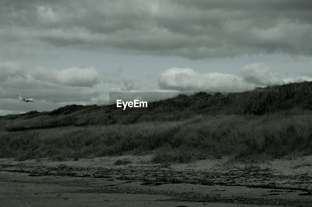SCENIC VIEW OF LAND AND SKY