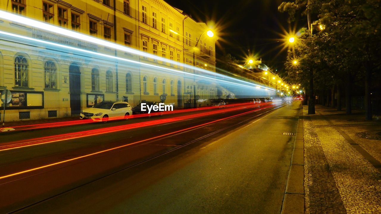 Light trails on street in city at night