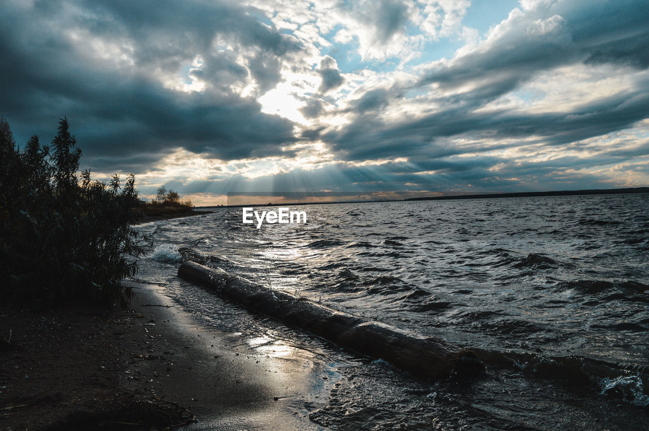 SCENIC VIEW OF SEA DURING SUNSET