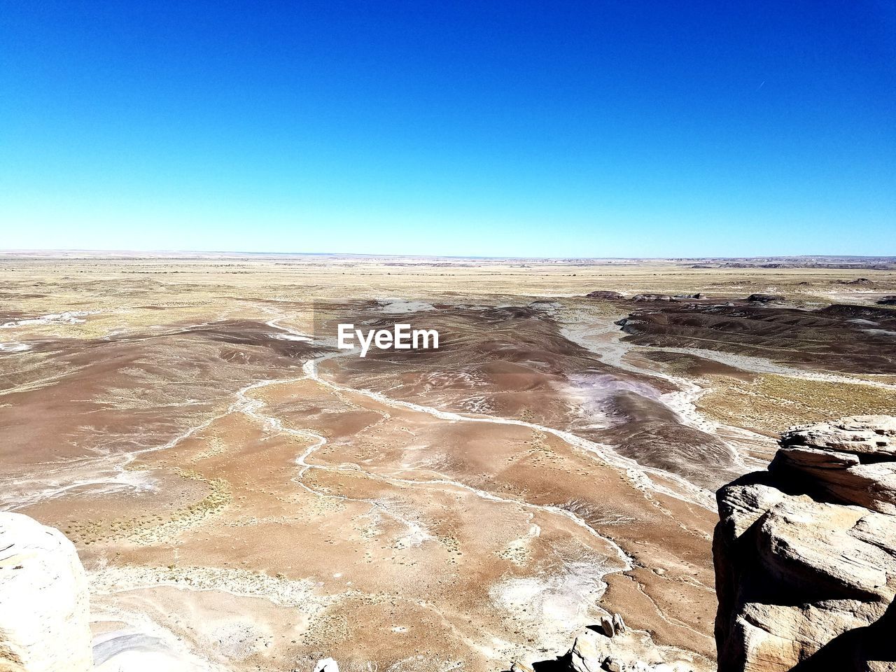 VIEW OF DESERT AGAINST CLEAR BLUE SKY