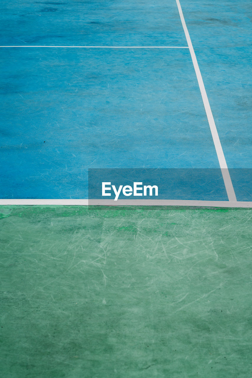 sports, net, no people, day, absence, flooring, nature, tennis, copy space, green, water, floor, high angle view, blue, swimming pool, outdoors, tennis court, net - sports equipment, empty, competition