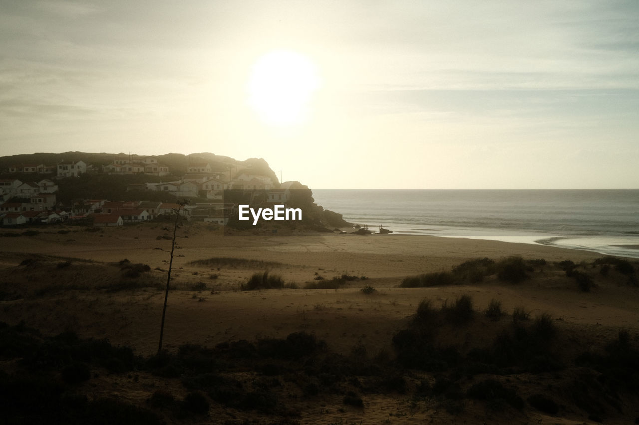 Scenic view on beach in arrifana, portugal during sunset. shot on fujifilm x100v.