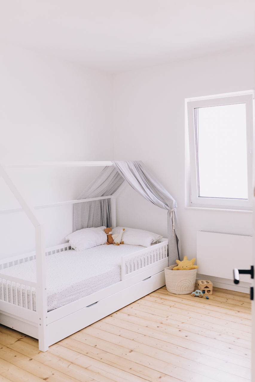 Minimalist children's room with montessori bed