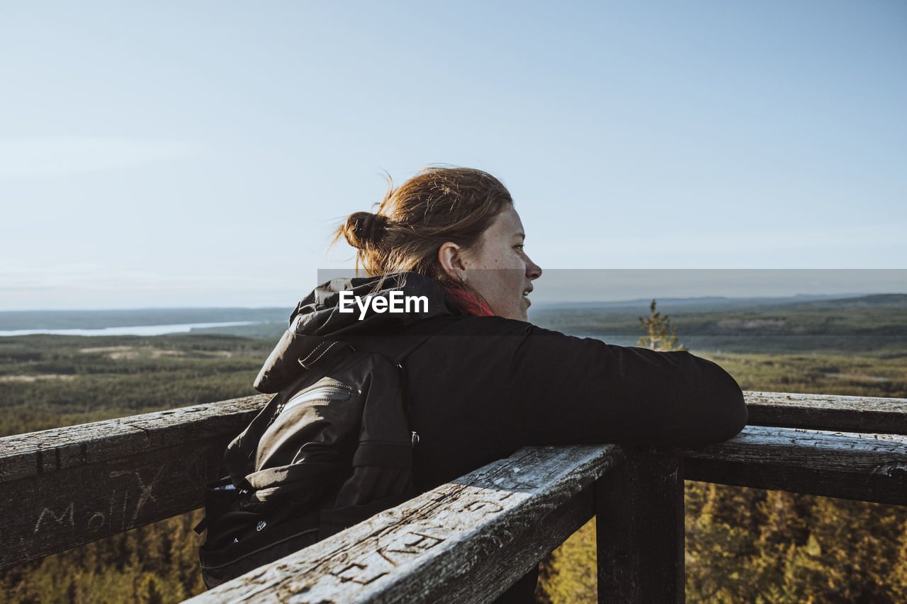 Female hiker looking at view