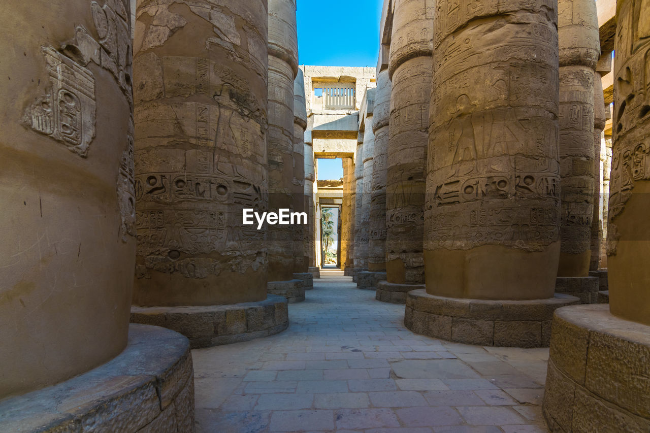 Columns  with hieroglyphics in the famous karnak temple in luxor, egypt. 