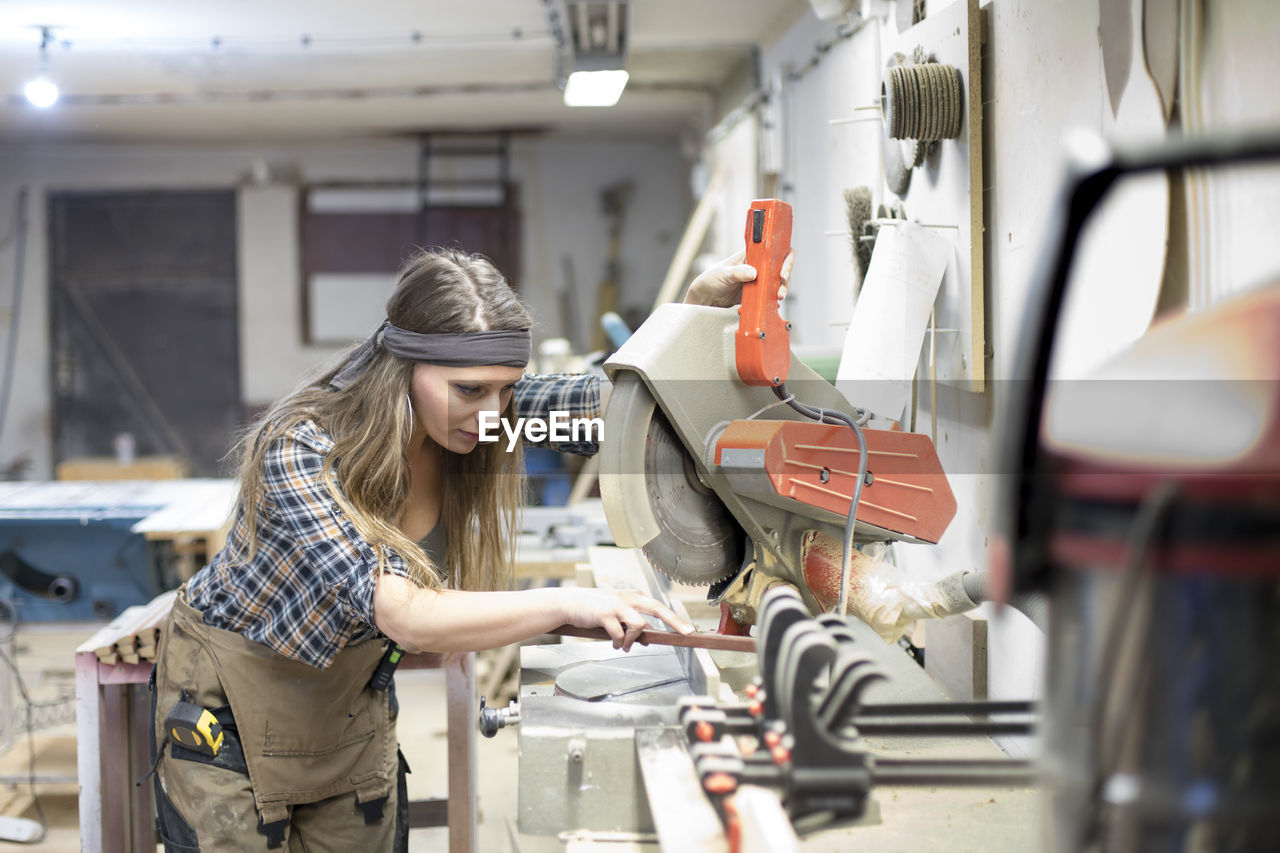 Woman working in workshop