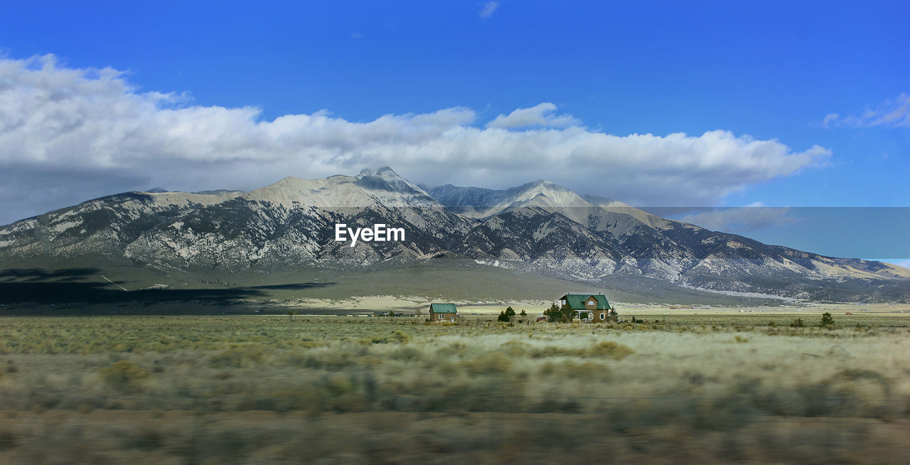 Scenic view of land against sky