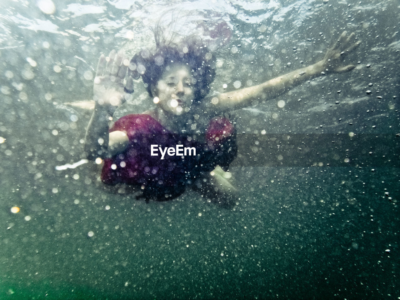 Woman swimming in sea