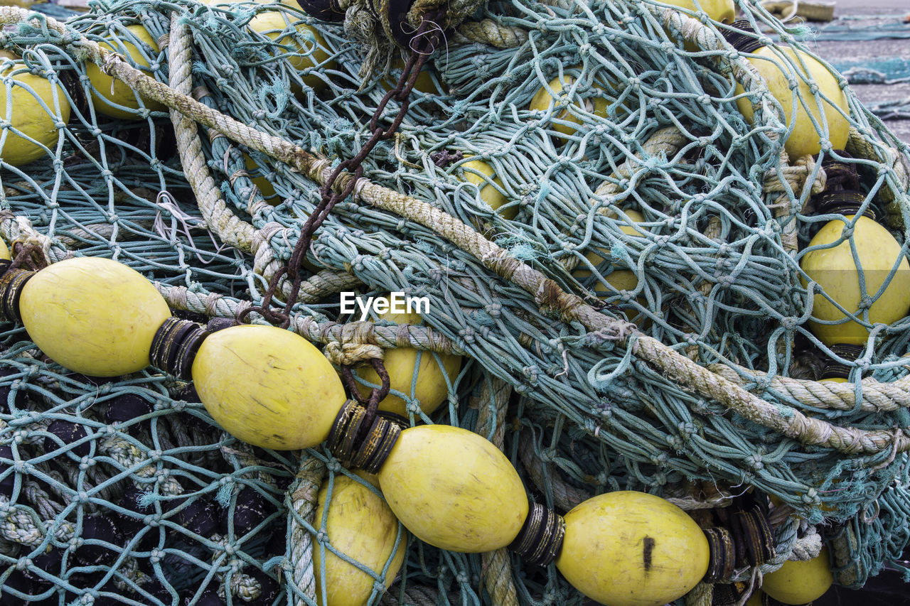 High angle view of fishing net at harbor