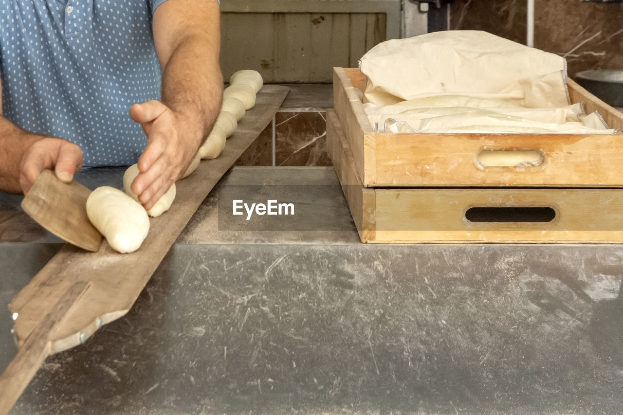 Close-up of man preparing food