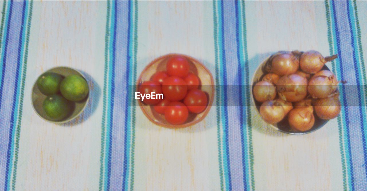 Fresh fruits and vegetables in bowls