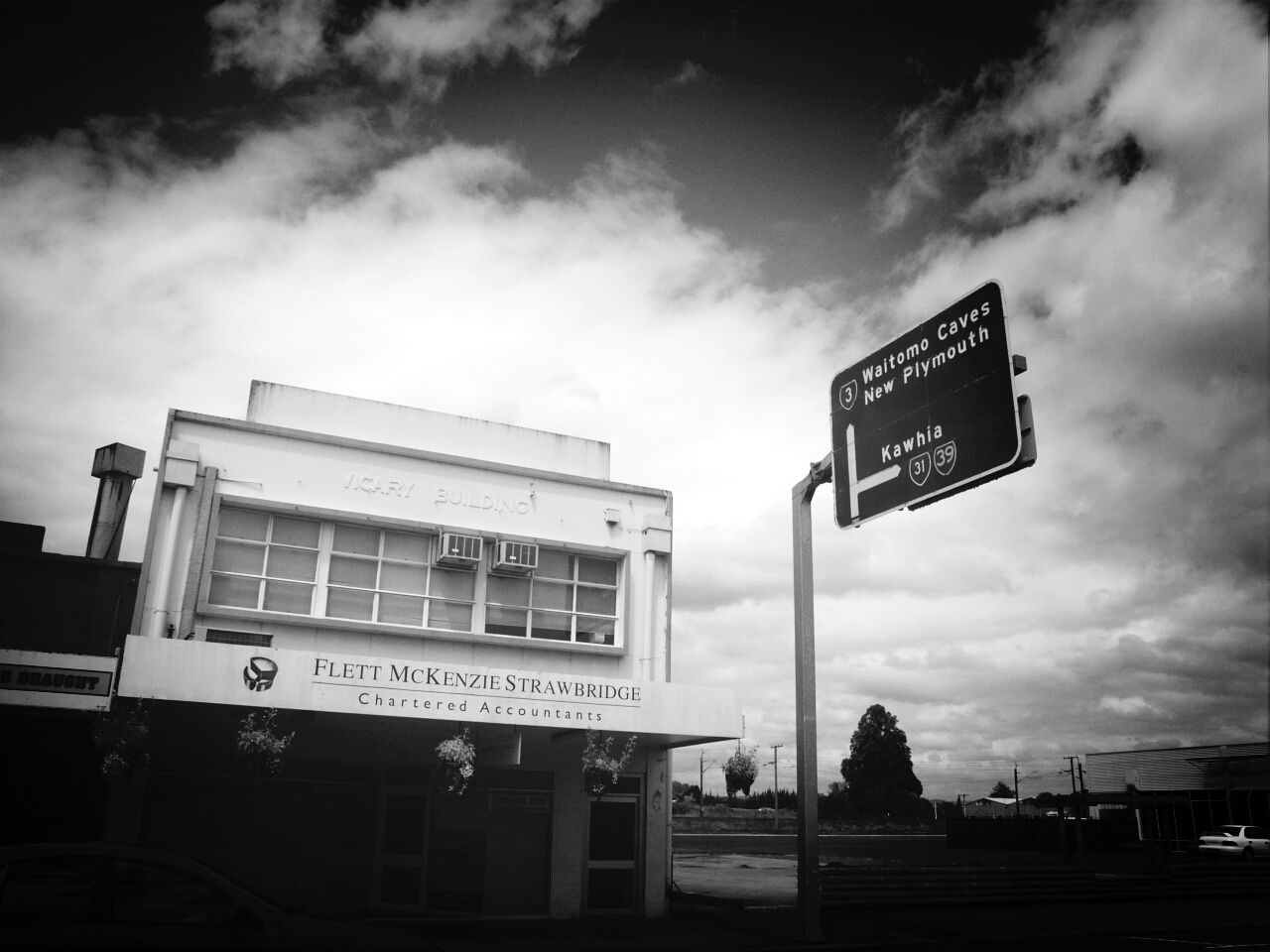 LOW ANGLE VIEW OF SIGN BOARD AGAINST SKY