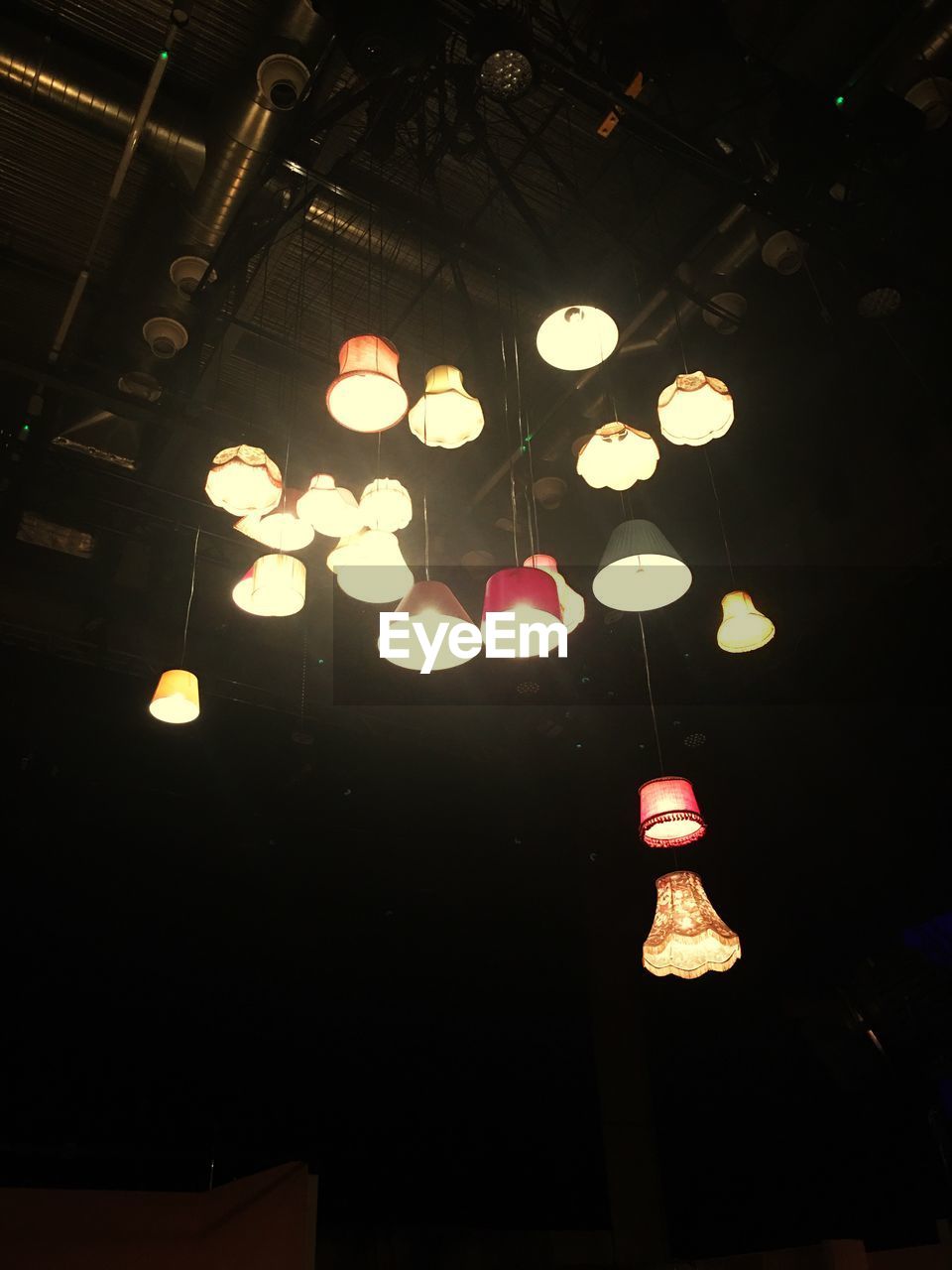 ILLUMINATED LANTERNS HANGING AT NIGHT DURING CHRISTMAS